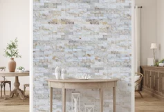 Rustikální šarm nebo moderní elegance: Použití kamenných obkladů na vnitřních stěnách